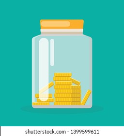 Money box with golden coins on green background. Savings.
