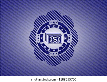 money icon inside emblem with denim high quality background