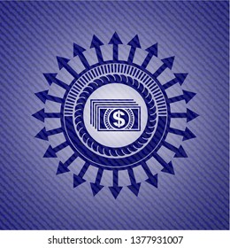 money icon inside emblem with jean background