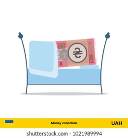 Money sleeping in the bed. Hryvnia banknote.