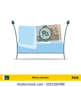 Money sleeping in the bed. Pakistan rupee banknote.


