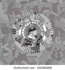 money tag icon inside grey camouflaged emblem