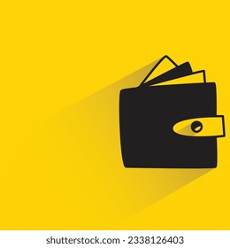 money wallet with shadow on yellow background