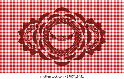 Money wings flying icon inside red checkered tablecloth realistic emblem. Restaurant handsome background. Illustration. 