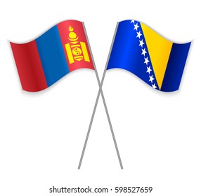 Mongolian and Bosnian crossed flags. Mongolia combined with Bosnia and Herzegovina isolated on white. Language learning, international business or travel concept.