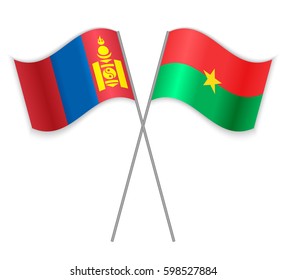 Mongolian and Burkinabe crossed flags. Mongolia combined with Burkina Faso isolated on white. Language learning, international business or travel concept.