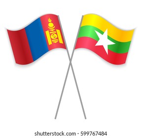 Mongolian and Burmese crossed flags. Mongolia combined with Myanmar isolated on white. Language learning, international business or travel concept.