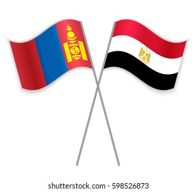 Mongolian and Egyptian crossed flags. Mongolia combined with Egypt isolated on white. Language learning, international business or travel concept.