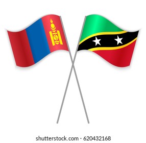 Mongolian and Kittitian crossed flags. Mongolia combined with Saint Kitts and Nevis isolated on white. Language learning, international business or travel concept.