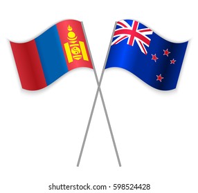 Mongolian and NZ crossed flags. Mongolia combined with New Zealand isolated on white. Language learning, international business or travel concept.