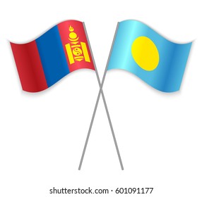 Mongolian and Palauan crossed flags. Mongolia combined with Palau isolated on white. Language learning, international business or travel concept.
