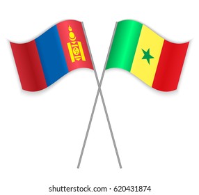 Mongolian and Senegalese crossed flags. Mongolia combined with Senegal isolated on white. Language learning, international business or travel concept.