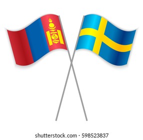 Mongolian and Swedish crossed flags. Mongolia combined with Sweden isolated on white. Language learning, international business or travel concept.