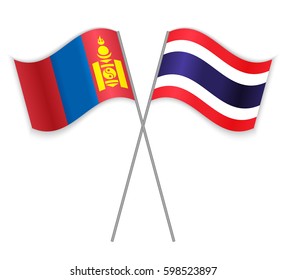 Mongolian and Thai crossed flags. Mongolia combined with Thailand isolated on white. Language learning, international business or travel concept.