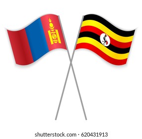 Mongolian and Ugandan crossed flags. Mongolia combined with Uganda isolated on white. Language learning, international business or travel concept.