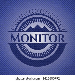 Monitor emblem with denim high quality background. Vector Illustration. Detailed.