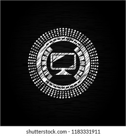 monitor icon drawn on a chalkboard