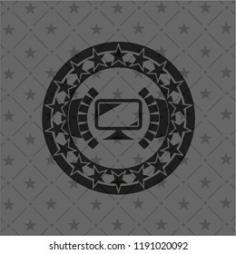 monitor icon inside black badge