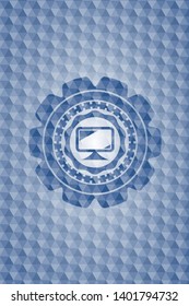 monitor icon inside blue emblem or badge with geometric pattern background.