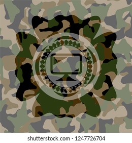 monitor icon inside camouflage emblem