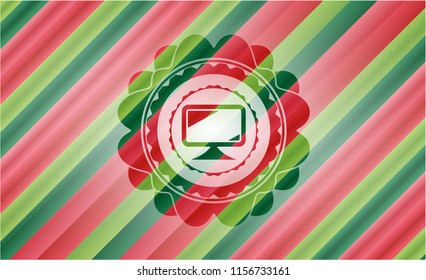 monitor icon inside christmas badge.