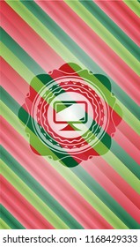 monitor icon inside christmas badge background.