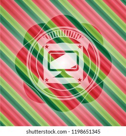 monitor icon inside christmas badge background.
