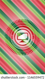 monitor icon inside christmas colors style badge.