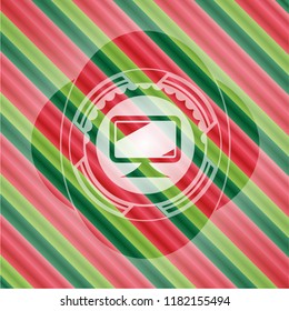 monitor icon inside christmas colors style badge.