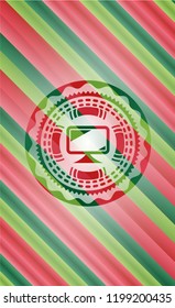 monitor icon inside christmas colors emblem.