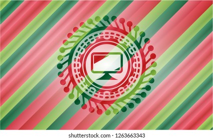 monitor icon inside christmas colors emblem.