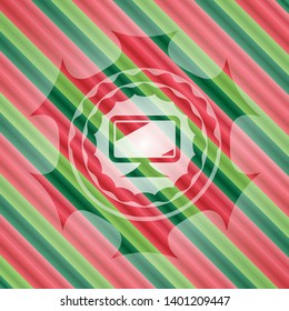 monitor icon inside christmas colors badge.