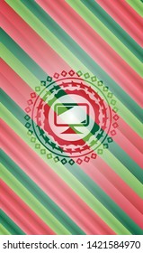 monitor icon inside christmas colors emblem.