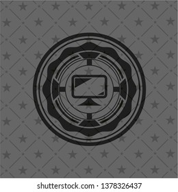 monitor icon inside dark badge or emblem