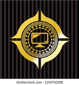 monitor icon inside gold emblem or badge