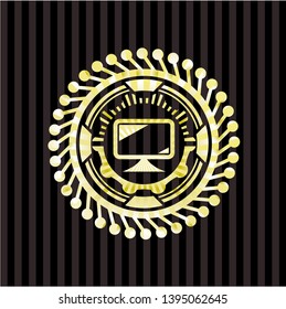 monitor icon inside gold emblem