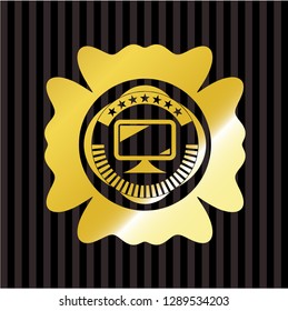 monitor icon inside golden emblem or badge