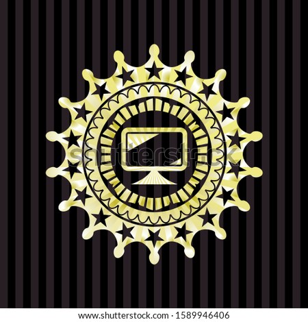 monitor icon inside golden emblem or badge