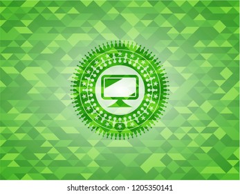 monitor icon inside green emblem. Mosaic background