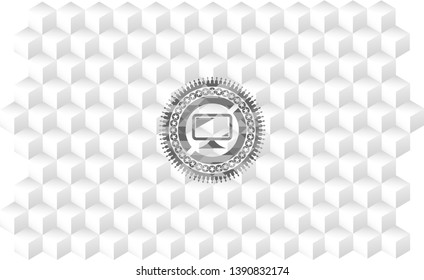 monitor icon inside grey badge with geometric cube white background