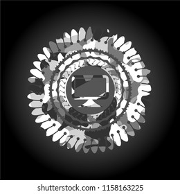 monitor icon inside grey camo emblem