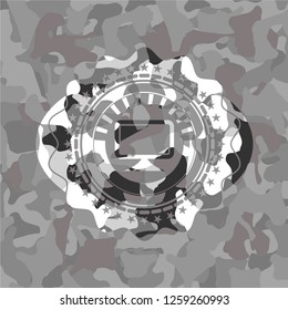 monitor icon inside grey camo emblem
