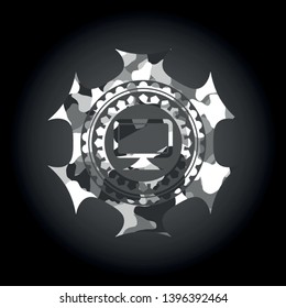 monitor icon inside grey camo emblem