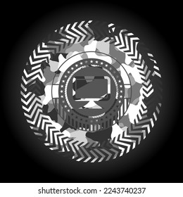 monitor icon inside grey camouflage texture. 