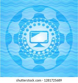 monitor icon inside light blue water wave emblem background.