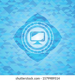 monitor icon inside light blue mosaic emblem