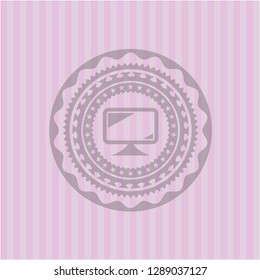 monitor icon inside pink emblem