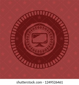 monitor icon inside realistic red emblem