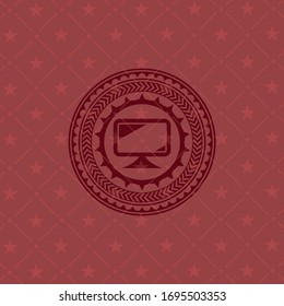 icono de monitor dentro de emblema rojo realista