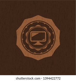monitor icon inside retro style wood emblem